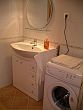 Badezimmer mit Waschmaschine in Comfort Appartement für längere Aufenthalt in Budapest